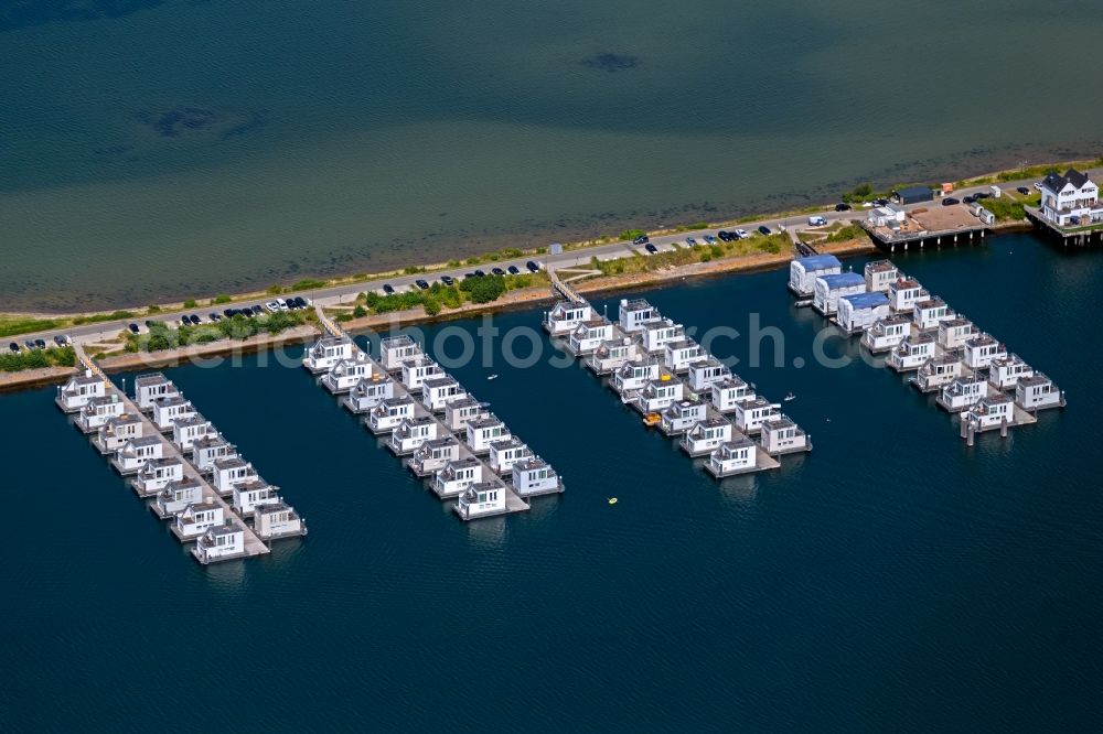 Aerial image Kappeln - House boat berths and moorings Schwimmende Haeuser on the shore area on Schleidamm in the district OstseeResort in Kappeln in the state Schleswig-Holstein, Germany