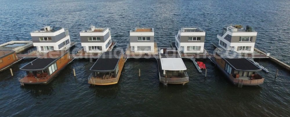Aerial image Bitterfeld-Wolfen - House boat berths and moorings on the shore area Grosser Goitzschesee in Bitterfeld-Wolfen in the state Saxony-Anhalt, Germany
