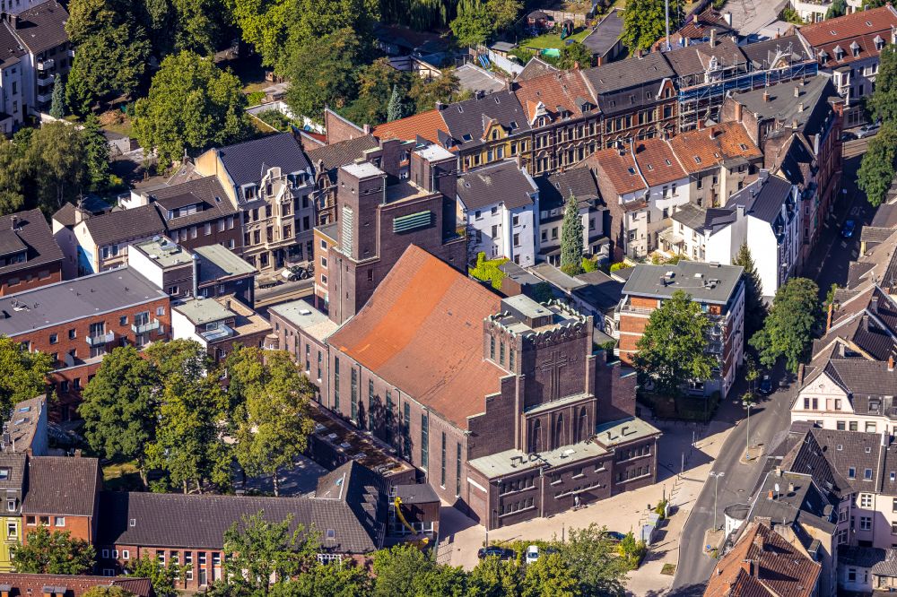 Gelsenkirchen from the bird's eye view: Construction site for renovation and reconstruction work on the church building Heilig-Kreuz-Kirche on Bochumer Strasse in the district Ueckendorf in Gelsenkirchen at Ruhrgebiet in the state North Rhine-Westphalia, Germany