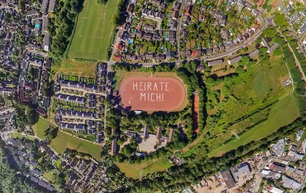 Aerial image Gelsenkirchen - Sports facility grounds of the stadium Rosenhuegel with MARRY ME lettering on Albert-Schweitzer-Strasse in the district of Beckhausen in Gelsenkirchen in the Ruhr area in the state North Rhine-Westphalia, Germany