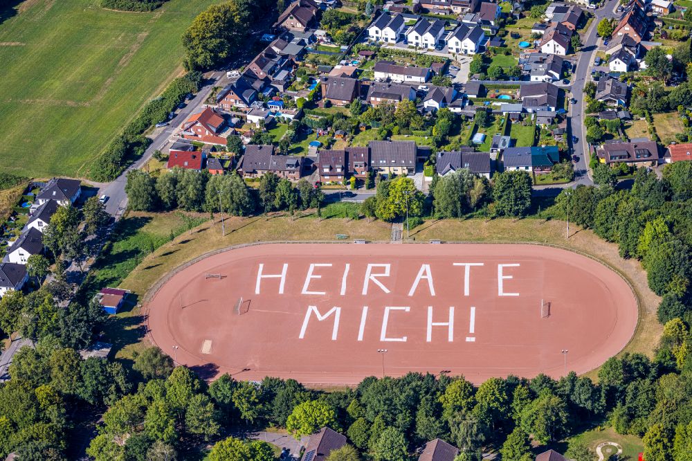 Aerial image Gelsenkirchen - Sports facility grounds of the stadium Rosenhuegel with MARRY ME lettering on Albert-Schweitzer-Strasse in the district of Beckhausen in Gelsenkirchen in the Ruhr area in the state North Rhine-Westphalia, Germany
