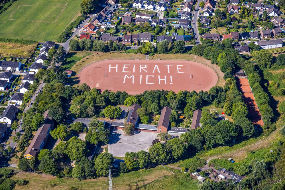 Aerial photograph Gelsenkirchen - Sports facility grounds of the stadium Rosenhuegel with MARRY ME lettering on Albert-Schweitzer-Strasse in the district of Beckhausen in Gelsenkirchen in the Ruhr area in the state North Rhine-Westphalia, Germany
