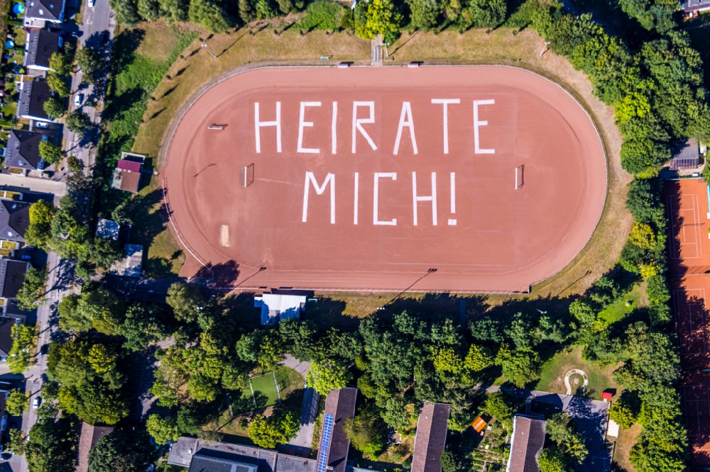 Gelsenkirchen from the bird's eye view: Sports facility grounds of the stadium Rosenhuegel with MARRY ME lettering on Albert-Schweitzer-Strasse in the district of Beckhausen in Gelsenkirchen in the Ruhr area in the state North Rhine-Westphalia, Germany