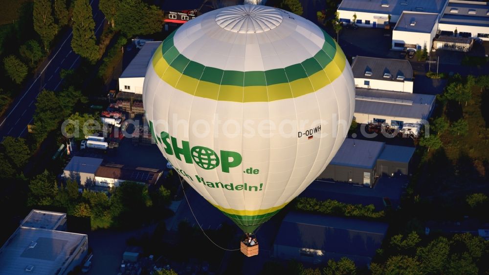 Oberpleis from above - Hot air balloon in flight over Oberpleis in the state North Rhine-Westphalia, Germany
