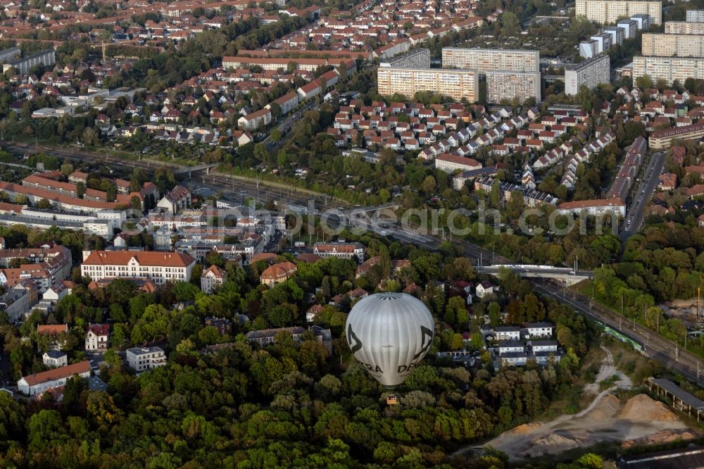 Leipzig from the bird's eye view: Hot air balloon with the identifier D-ODTI flying over the airspace in the district Connewitz in Leipzig in the state Saxony, Germany