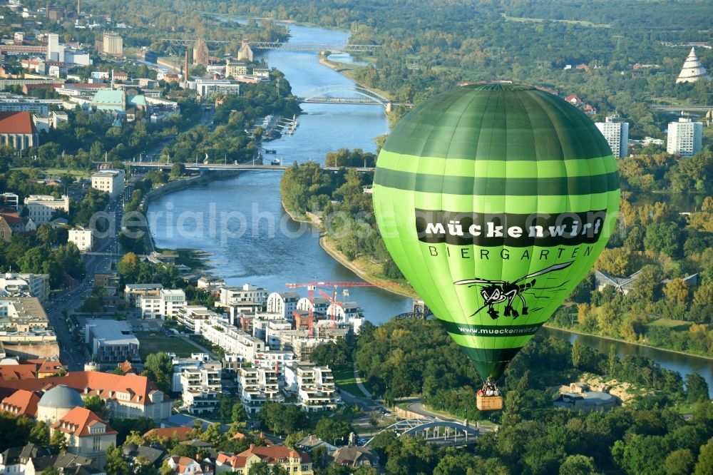 Magdeburg from above - Hot air balloon with of Kennung D-OEKY Mueckenwirt flying in the airspace in Magdeburg in the state Saxony-Anhalt, Germany