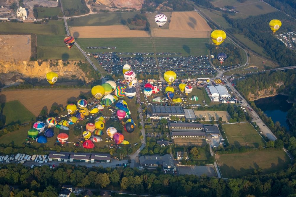 Aerial photograph Warstein - Hot air balloon Warsteiner Montgolfiade flying over the airspace in Warstein in the state North Rhine-Westphalia, Germany