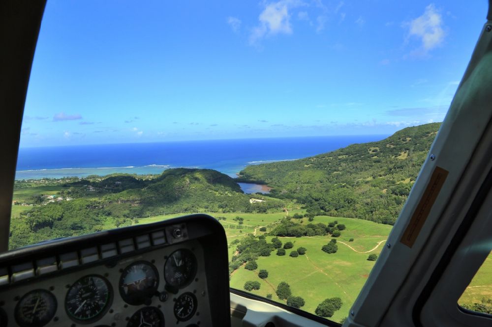 Baie du Cap from the bird's eye view: Flight with the helicopter over the landscape in the southwest of the island Mauritius at Baie du Cap in the Indian Ocean