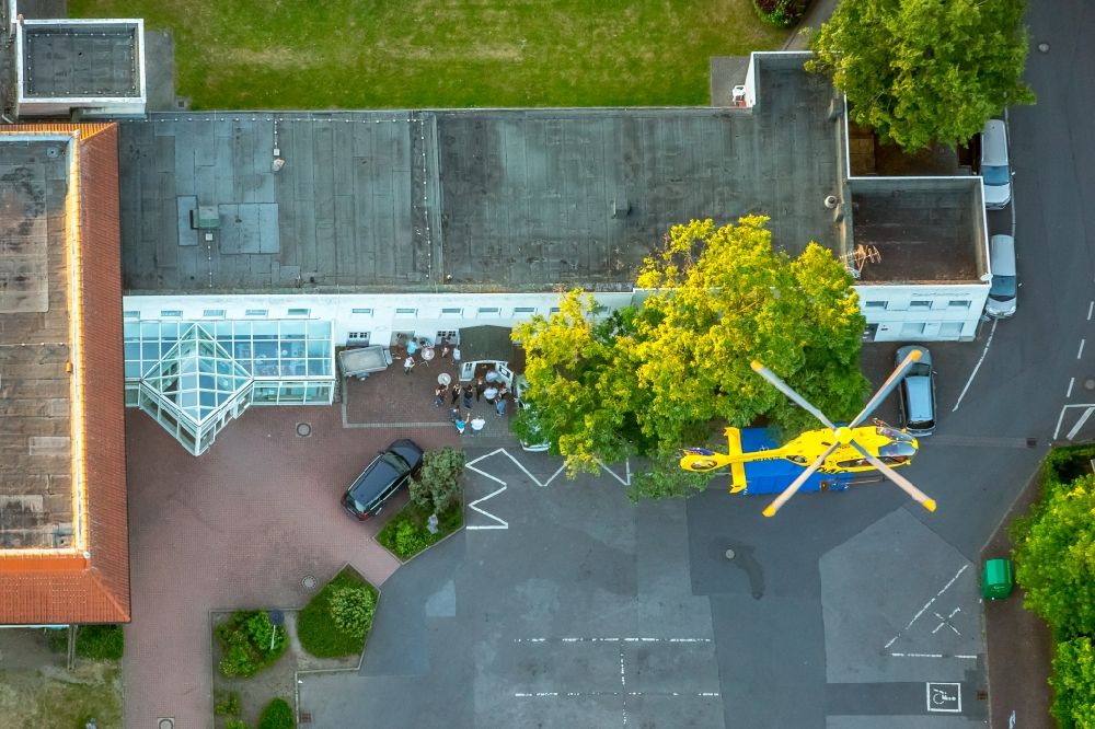 Aerial image Bergkamen - Yellow Helicopter in flight company ADAC Luftrettung of type Eurocopter EC-135P-2 over the air space in Bergkamen in the state North Rhine-Westphalia, Germany