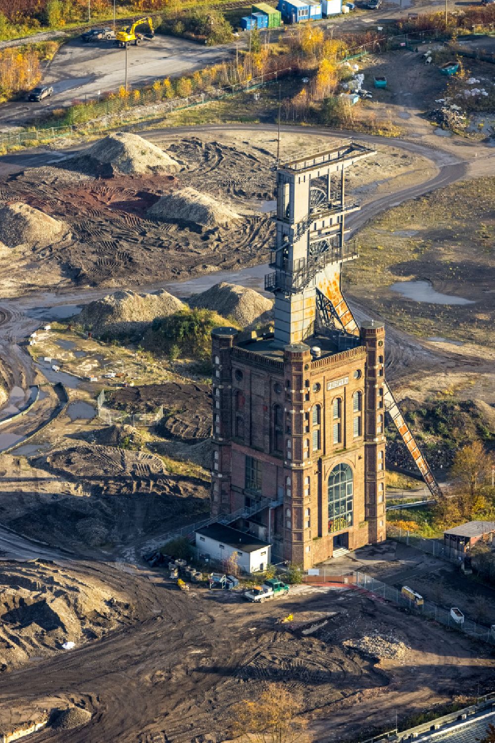 Bottrop from the bird's eye view: Autumnal discolored vegetation view Demolition work on the site of the Industry- ruins Industrial monument Malakoff Tower on the former Prosper colliery on street Knappenstrasse in Bottrop at Ruhrgebiet in the state North Rhine-Westphalia, Germany