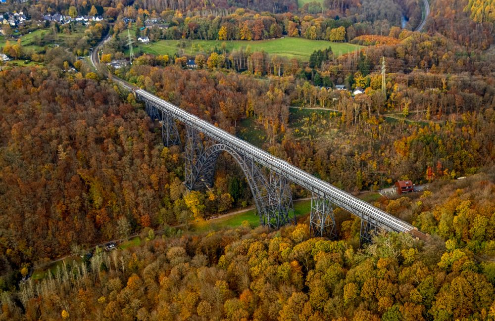 Aerial image Müngsten - Autumnal discolored vegetation view railway bridge building to route the train tracks Muengstener Bruecke in Muengsten in the state North Rhine-Westphalia, Germany