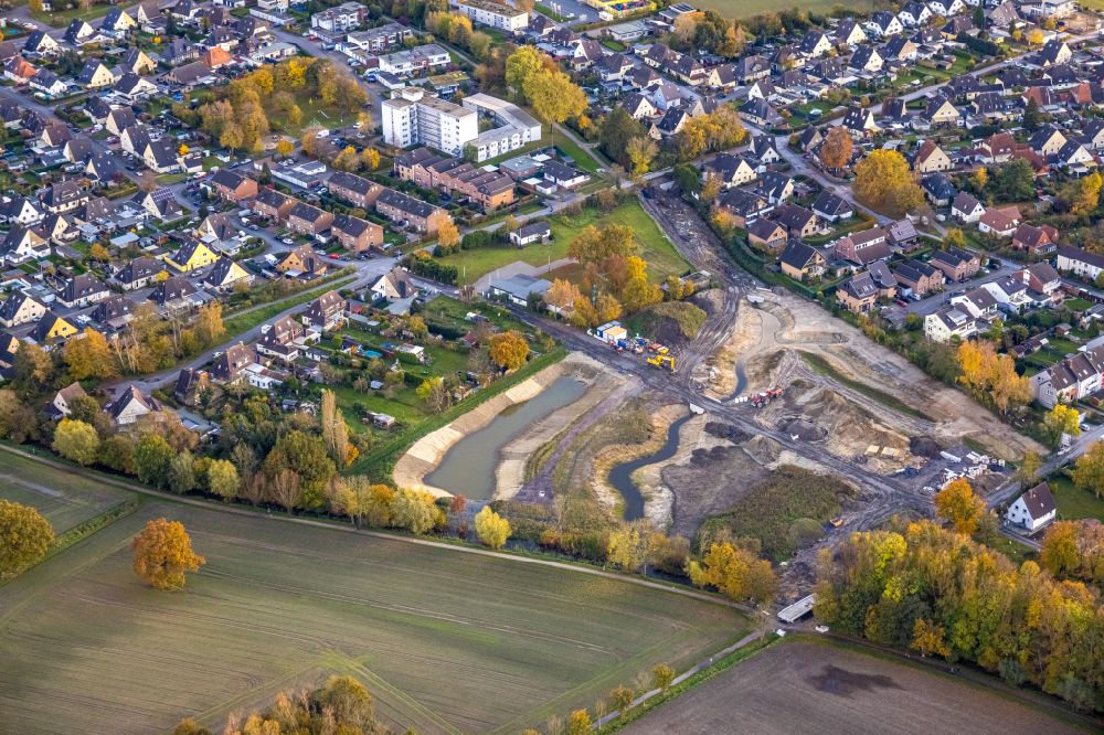 Aerial image Hamm - Autumnal discolored vegetation view construction site with development works and embankments works on street Mennenkamp in the district Norddinker in Hamm at Ruhrgebiet in the state North Rhine-Westphalia, Germany