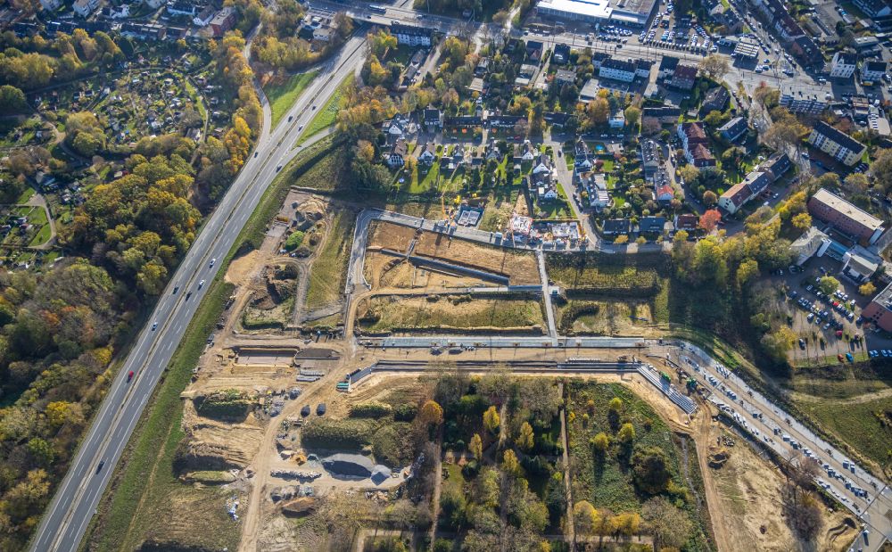 Aerial image Bochum - Autumnal discolored vegetation view Construction site with development and earth piling work at the Ostpark Quartier Feldmark in the district of Altenbochum in Bochum in the Ruhr area in the state of North Rhine-Westphalia, Germany