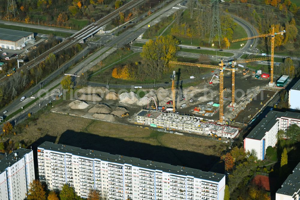 Aerial image Berlin - Autumnal discolored vegetation view Construction site to build a new multi-family residential complex Trusetaler Strasse corner Wuhletalstrasse on street Maerkische Allee in the district Marzahn in Berlin, Germany