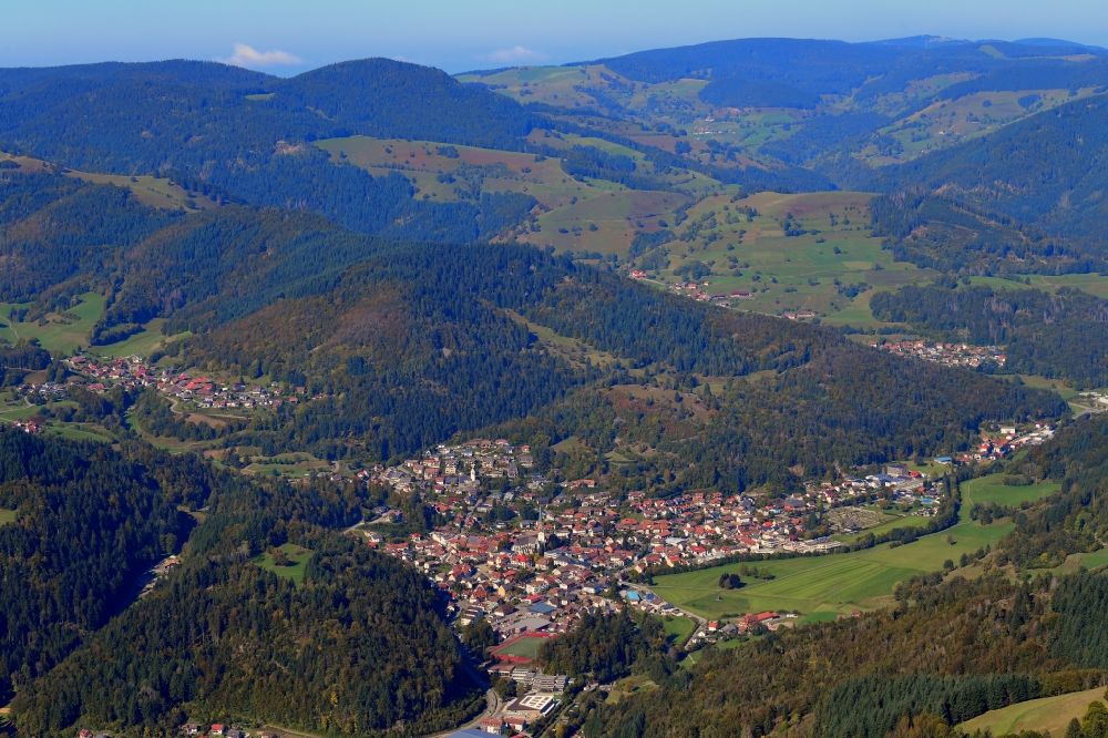 Schönau im Schwarzwald from the bird's eye view: Autumnal discolored vegetation view and landscape in the Black Forest and town Schoenau in the valley of the river Wiese in the state Baden-Wurttemberg
