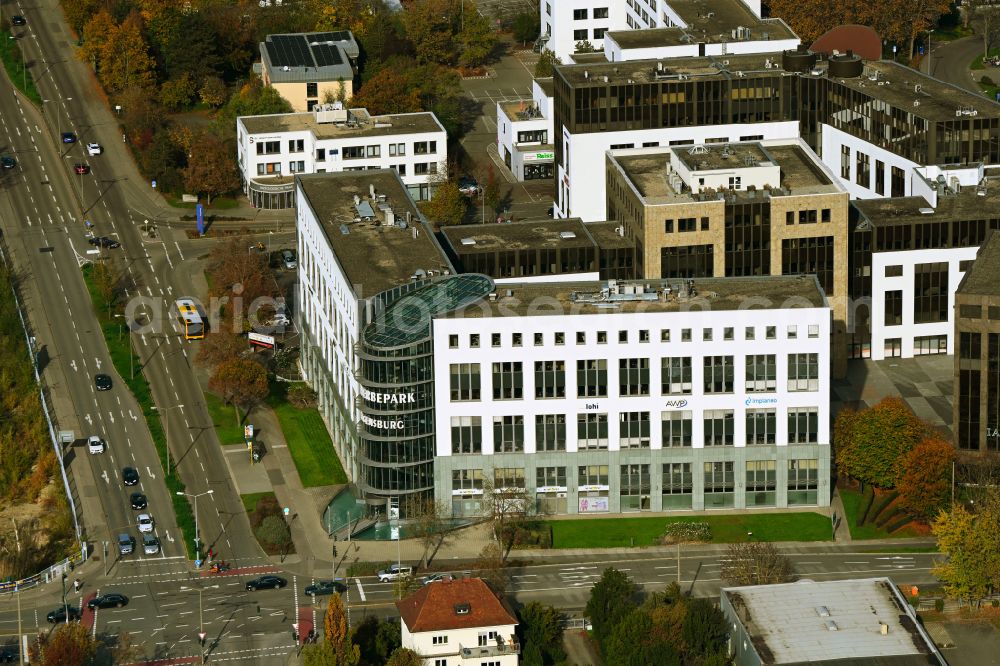 Regensburg from the bird's eye view: Autumn colored vegetation view Office building of the administration and commercial building Gewerbepark Regensburg on Lechstrasse - Donaustaufer Strasse in Regensburg in the state Bavaria, Germany