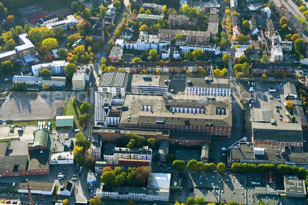 Hamburg from the bird's eye view: Autumnal discolored vegetation view Office building of the administration and commercial building on Morewoodstrasse - Neumann-Reichardt-Strasse - Von-Bargen-Strasse in the Wandsbek district in Hamburg, Germany