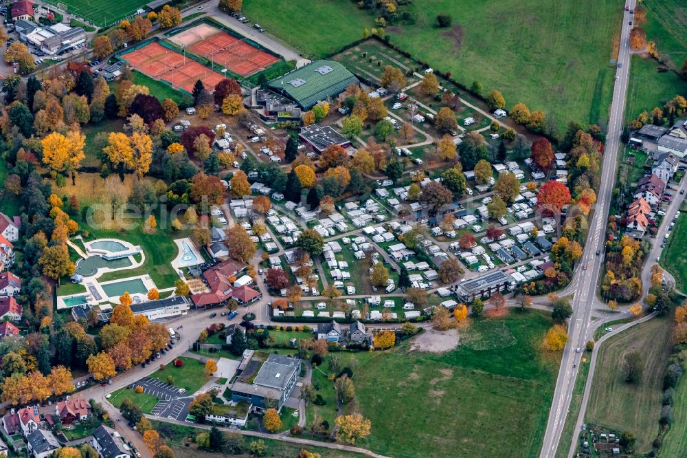 Aerial photograph Kirchzarten - Autumnal discolored vegetation view camping with caravans and tents in Kirchzarten in the state Baden-Wuerttemberg, Germany