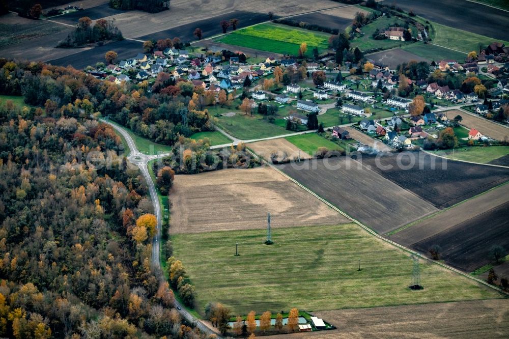 Aerial image Diebolsheim - Autumnal discolored vegetation view Village - view on the edge of agricultural fields and farmland in Diebolsheim in the Elsass, France