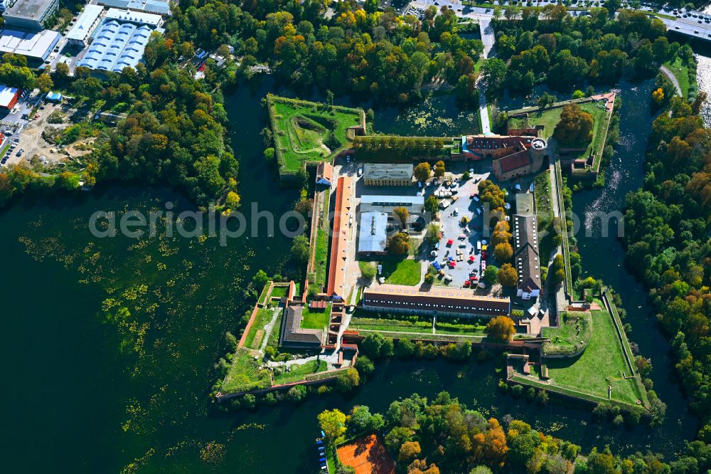 Berlin from the bird's eye view: Autumnal discolored vegetation view fortress complex Zitadelle Spandau with a star-shaped park on the Juliusturm in the district Haselhorst in Berlin, Germany