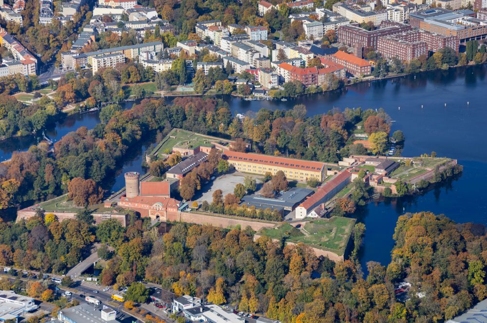 Berlin from above - Autumnal discolored vegetation view fortress complex Zitadelle Spandau with a star-shaped park on the Juliusturm in the district Haselhorst in Berlin, Germany