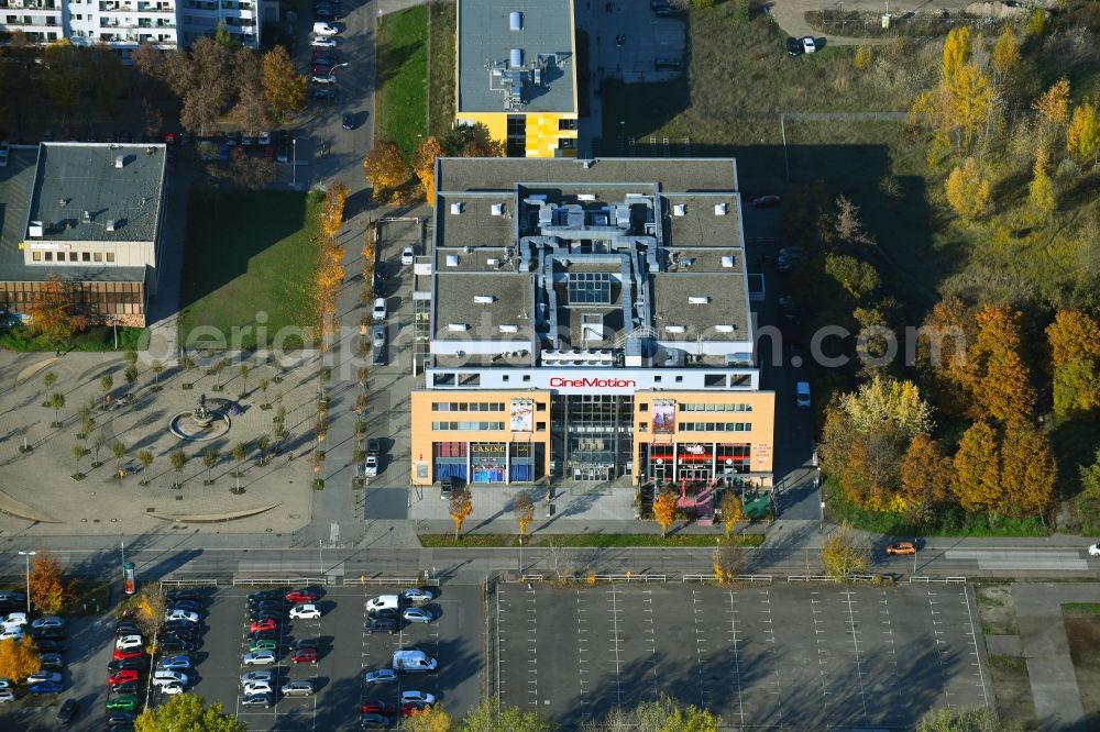 Berlin from above - Autumnal discolored vegetation view building of the cinema - movie theater CineMotion on Wartenberger Strasse in the district Neu-Hohenschoenhausen in Berlin, Germany