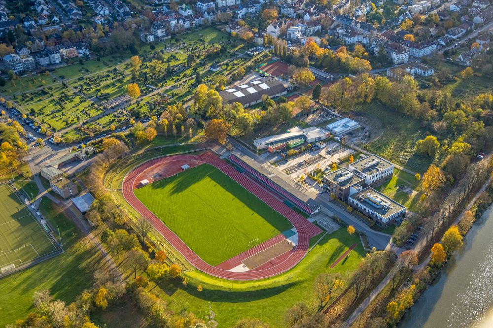 Aerial image Hamm - Autumnal discolored vegetation view football stadium Jahnstadion on the street Juergen-Graef-Allee in the district Heessen in Hamm in the Ruhr area in the state North Rhine-Westphalia, Germany