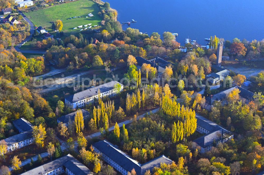 Aerial image Potsdam - Autumnal discolored vegetation view Building complex of the former military barracks of Entwicklungstraeger Potsdam GmbH on Krampnitzsee in Fahrland in the state Brandenburg, Germany