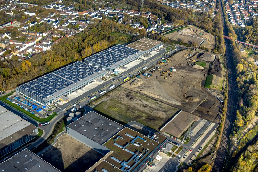 Aerial image Gelsenkirchen - Autumnal discolored vegetation view of a high-bay warehouse building complex and logistics center on the Europastrasse in the district of Bulmke-Huellen in Gelsenkirchen in the Ruhr area in the state of North Rhine-Westphalia, Germany