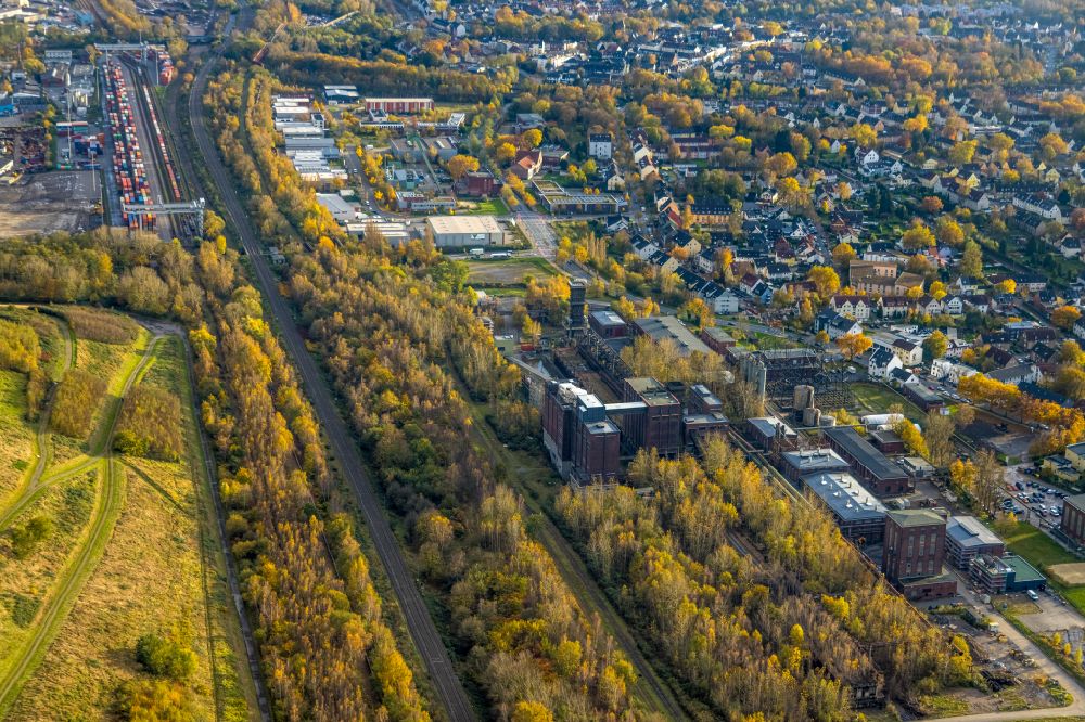 Dortmund from above - Autumnal discolored vegetation view industrial monument of the disused technical facilities on the former site of the Kokerei Hansa on street Emscherallee in Dortmund in the state North Rhine-Westphalia, Germany
