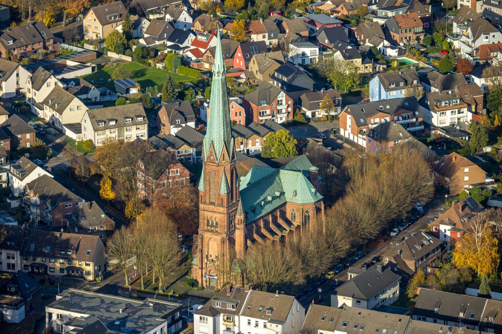 Aerial photograph Bottrop - Autumnal discolored vegetation view church building Liebfrauenkirche on street Nordring in the district Eigen in Bottrop at Ruhrgebiet in the state North Rhine-Westphalia, Germany