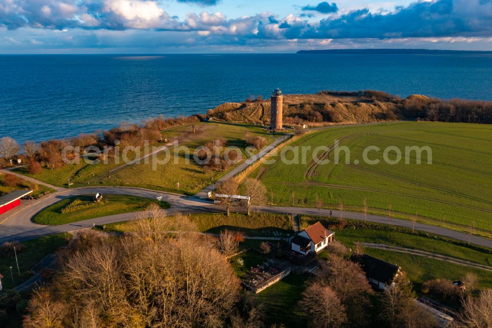 Putgarten from the bird's eye view: Autumnal discolored vegetation view lighthouse as a historic seafaring character in the coastal area of Kap Arkona in Putgarten in the state Mecklenburg - Western Pomerania, Germany