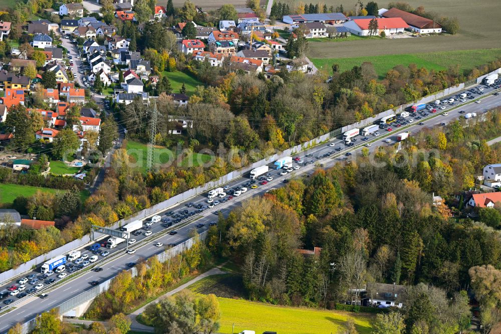 Aerial photograph München - Autumnal discolored vegetation view lorries crowded in traffic jams in the lanes of the route of the motorway BAB A99 in the district Feldmoching-Hasenbergl in Munich in the state Bavaria, Germany