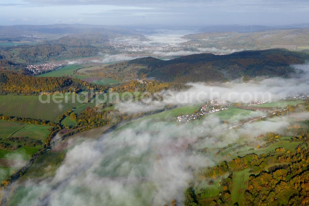 Witzenhausen from above - Autumnal discolored vegetation view weather related fog banks and cloud layer in Witzenhausen in the state Hesse, Germany