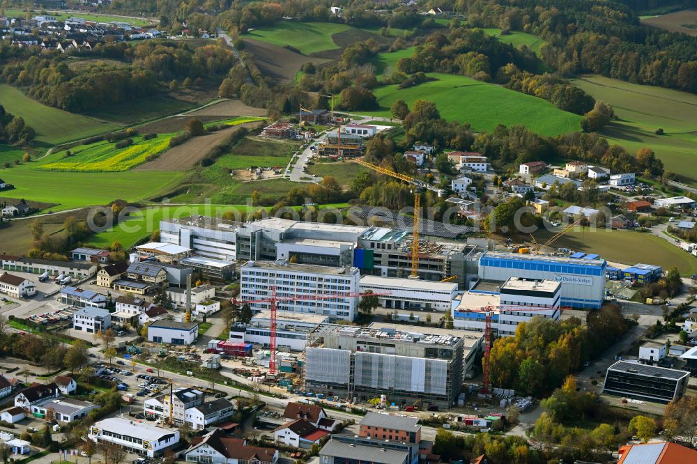 Pfaffenhofen an der Ilm from the bird's eye view: Autumnal discolored vegetation view New building - construction site production hall and laboratory building on the factory premises of the pharmaceutical company Daiichi Sankyo in Pfaffenhofen an der Ilm in the state Bavaria, Germany