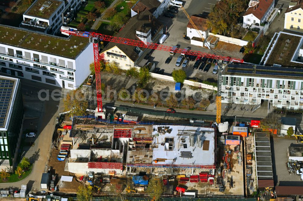 Aerial photograph Regensburg - Autumn discolored view of vegetation Construction site for a new office building Be orange on Fritz-Fend-Strasse - Im Gueterbahnhof in the district Innenstadt in Regensburg in the state Bavaria, Germany