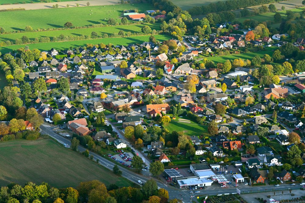 Braak from above - Autumnal discolored vegetation view town View of the streets and houses of the residential areas in Braak in the state Schleswig-Holstein, Germany