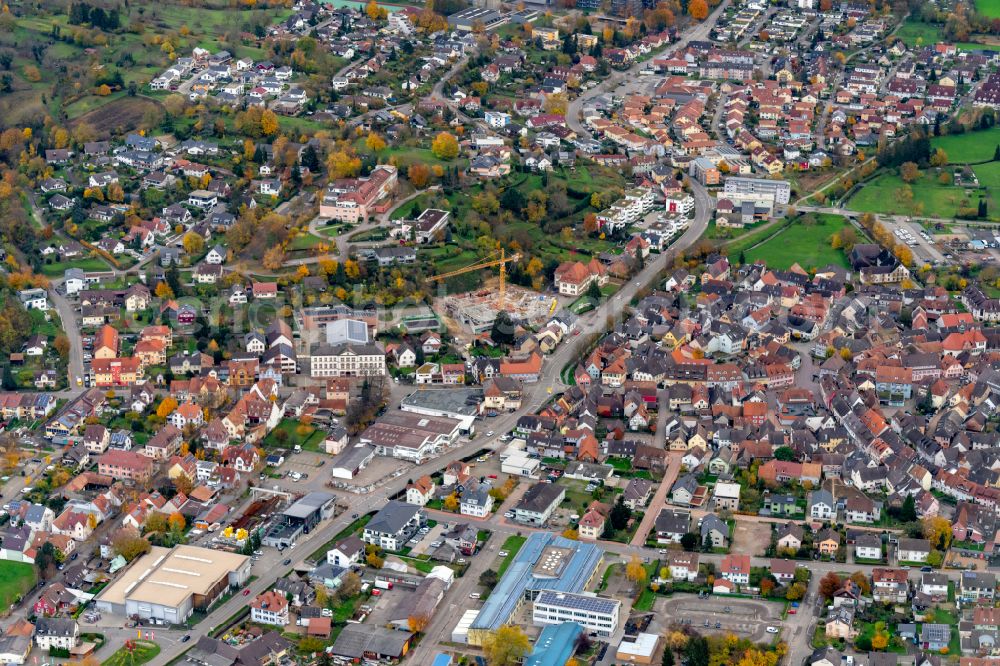 Ettenheim from the bird's eye view: Autumnal discolored vegetation view town View of the streets and houses of the residential areas on street Rheinstrasse in Ettenheim in the state Baden-Wurttemberg, Germany