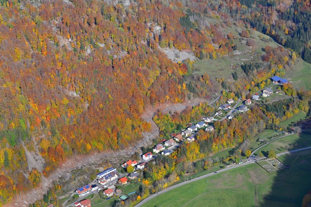 Todtnau from above - Autumnal discolored vegetation and location view of the of residential areas in the valley landscape surrounded by mountains in Geschwend in the state Baden-Wuerttemberg, Germany