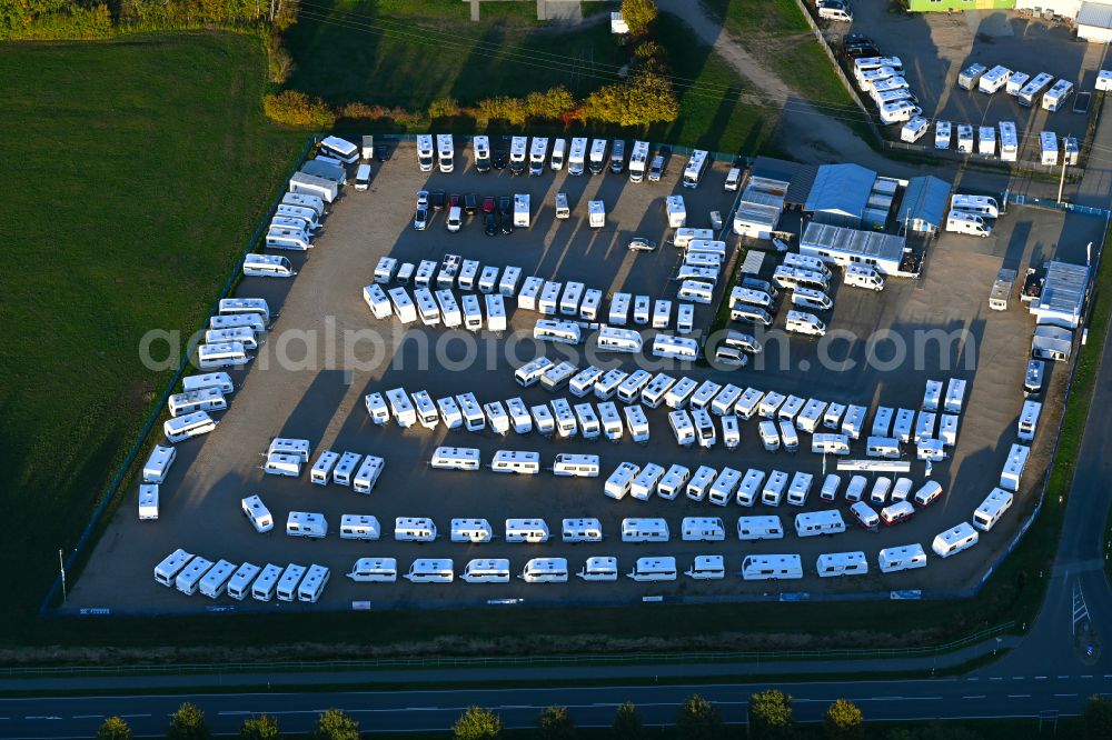 Kremmin from the bird's eye view: Autumnal discolored vegetation view parking and storage space for Caravan- automobiles in Kremmin in the state Mecklenburg - Western Pomerania