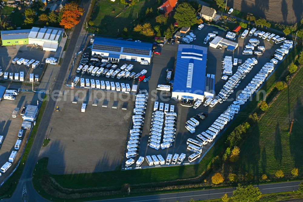 Aerial image Kremmin - Autumnal discolored vegetation view parking and storage space for Caravan- automobiles in Kremmin in the state Mecklenburg - Western Pomerania
