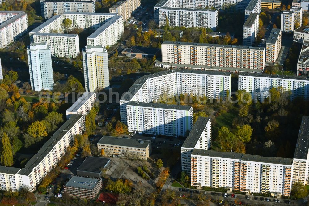 Aerial image Berlin - Autumnal discolored vegetation view skyscrapers in the residential area of industrially manufactured settlement Barther Strasse - Falkenberger Chausee in the district Neu-Hohenschoenhausen in Berlin, Germany