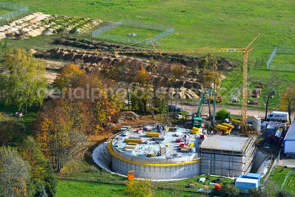 Aerial image Werneuchen - Autumnal discolored vegetation view construction site for the new construction of the retention basin and water storage on street Wesendahler Strasse in Werneuchen in the state Brandenburg, Germany