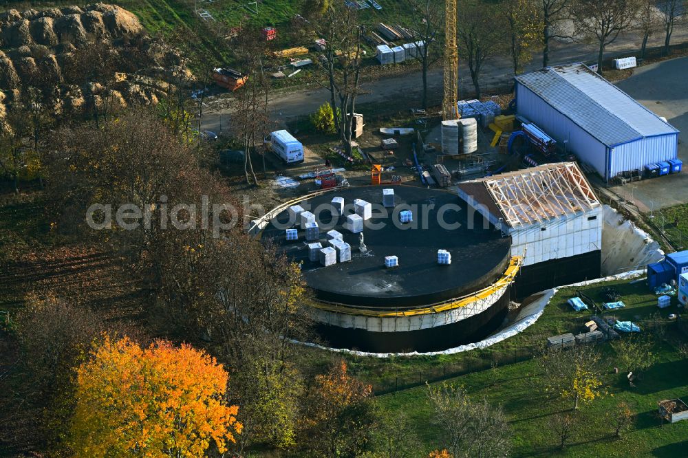 Werneuchen from above - Autumnal discolored vegetation view construction site for the new construction of the retention basin and water storage on street Wesendahler Strasse in Werneuchen in the state Brandenburg, Germany