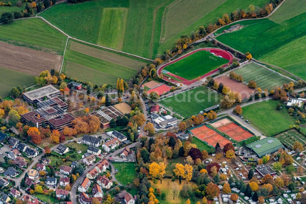 Aerial image Kirchzarten - Autumnal discolored vegetation view school building of the Marie-Curie-Gymnasiumund Sportanlagen in Kirchzarten in the state Baden-Wuerttemberg, Germany