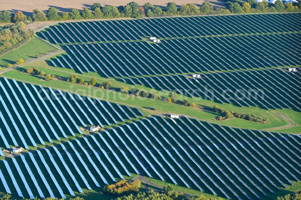 Aerial image Lanken - Autumnal discolored vegetation view rows of panels of a solar power plant and photovoltaic system on a field in Lanken in the state Schleswig-Holstein, Germany