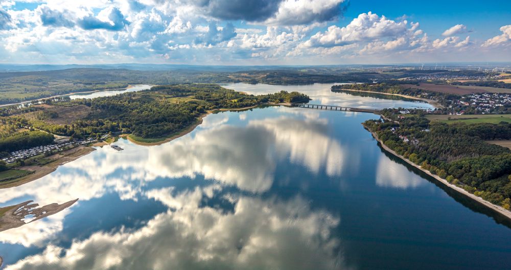 Aerial image Möhnesee - Autumnal discolored vegetation view Dam and bank areas at the Moehnesee reservoir with cloud reflection in Moehnsee in the state North Rhine-Westphalia, Germany