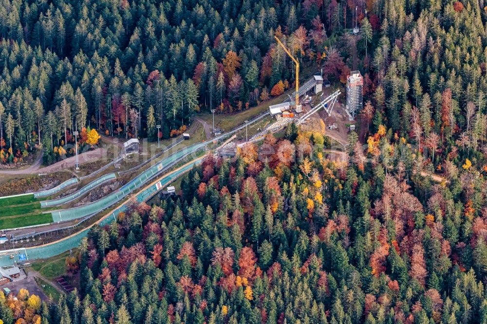 Hinterzarten from the bird's eye view: Autumnal discolored vegetation view training and competitive sports center of the ski jump Baustelle in Hinterzarten in the state Baden-Wuerttemberg, Germany