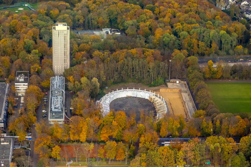 Aerial photograph Köln - Autumnal discolored vegetation view of the construction site for the reconstruction of the racetrack - parkour Radstadion Koeln on the street Olympiaweg in the district of Muengersdorf in Cologne in the state North Rhine-Westphalia, Germany