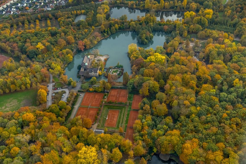 Gladbeck from above - Autumnal discolored vegetation view Building and castle park systems of water castle Wittringen in Gladbeck in the state North Rhine-Westphalia